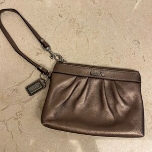 Coach bronze wristlet